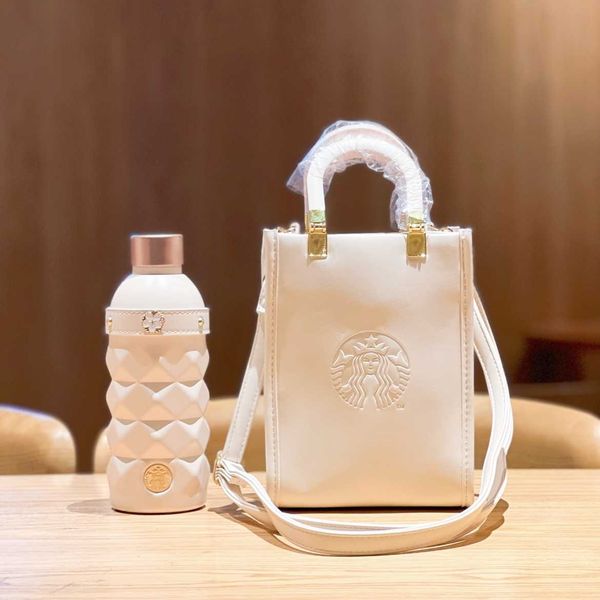 starbucks 2022 cherry blossom milk white cut stainless steel traveling cup thermos cup with handbag
starbucks 2022 cherry blossom milk white cut stainless steel traveling cup thermos cup with handbag