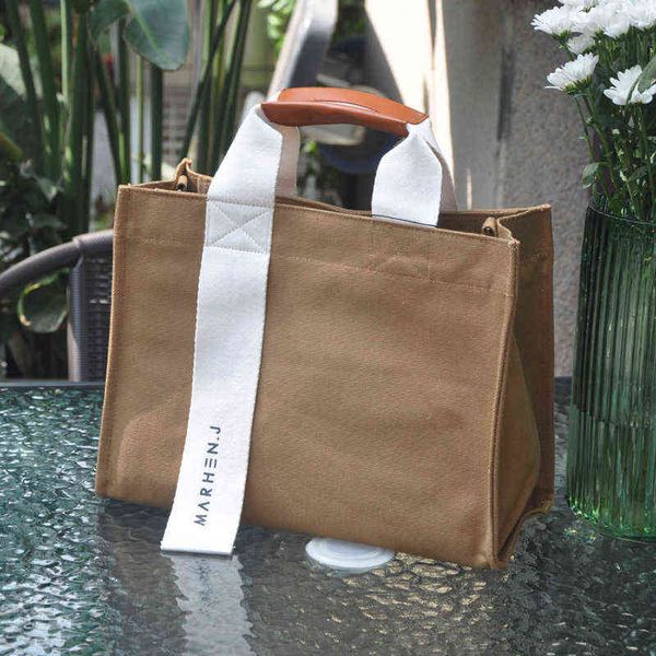 south korean designer canvas handbag high-capacity public bag female minority work bag handbag 220617
south korean designer canvas handbag high-capacity public bag female minority work bag handbag 220617