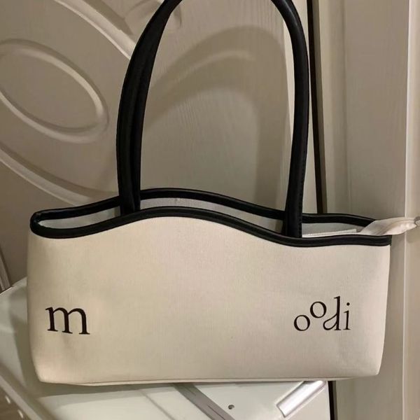 niche design handbag women's 2022 new trendy shoulder bag all-match large-capacity canvas underarm bag
niche design handbag women's 2022 new trendy shoulder bag all-match large-capacity canvas underarm bag