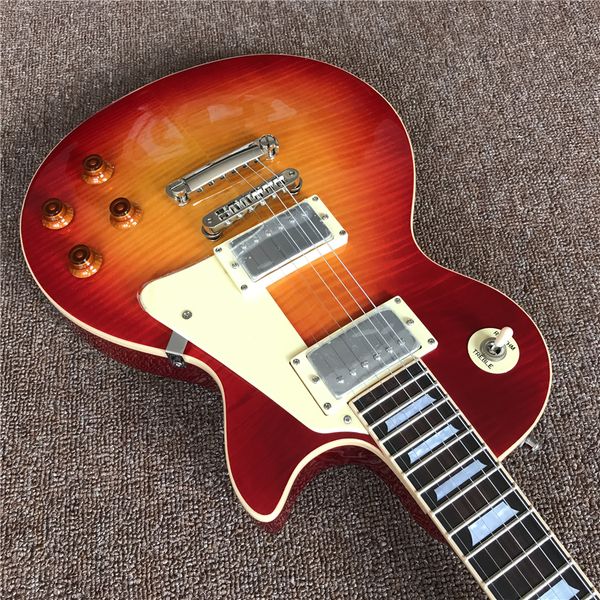 new arrival custom honeyburst electric guitar with one piece body and neck , cream frets end binding , chrome hardware
new arrival custom honeyburst electric guitar with one piece body and neck , cream frets end binding , chrome hardware