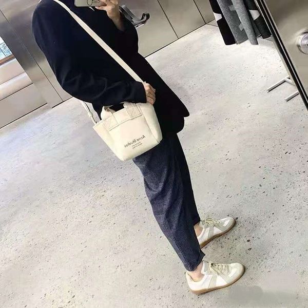 men's vivian high-quality and women's canvas bags tide brand acne hand-held messenger large-capacity all-match tote bag white fash
men's vivian high-quality and women's canvas bags tide brand acne hand-held messenger large-capacity all-match tote bag white fash
