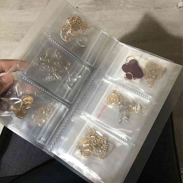 84 grid transparent jewelry storage albums gifts with zip-lock bag reclosable necklace rings bags portable earring display cover, Pink;blue
84 grid transparent jewelry storage albums gifts with zip-lock bag reclosable necklace rings bags portable earring display cover, Pink;blue