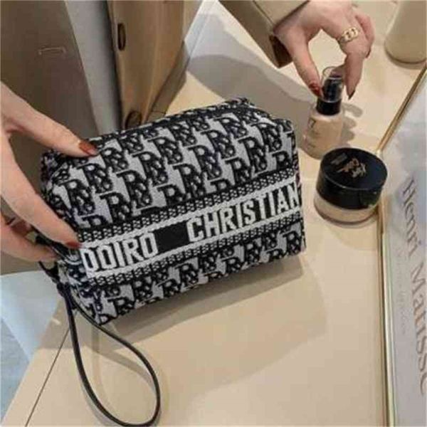 factory direct sale fog flower versatile letter foreign style hand large capacity cosmetic bag
factory direct sale fog flower versatile letter foreign style hand large capacity cosmetic bag