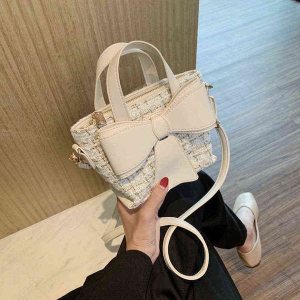 net red texture woven bag women's autumn new one shoulder messenger bag korean fashion bow small square 220509
net red texture woven bag women's autumn new one shoulder messenger bag korean fashion bow small square 220509