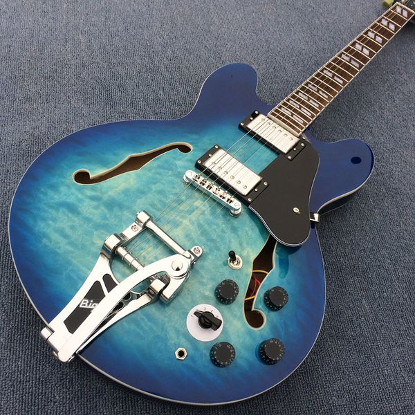 electric guitar, blue flame maple jazz guitar, chrome-plated hardware with tremolo system
electric guitar, blue flame maple jazz guitar, chrome-plated hardware with tremolo system