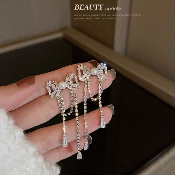 silver stud rhinestone-encrusted zircon pearl bow tassel earrings korean fairy lovely fancy rhinestone earrings graceful eardrop, Golden
silver stud rhinestone-encrusted zircon pearl bow tassel earrings korean fairy lovely fancy rhinestone earrings graceful eardrop, Golden