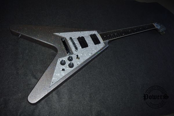 v-shaped silver powder large particle aircraft six string electric guitar our shop can customize various guitars
v-shaped silver powder large particle aircraft six string electric guitar our shop can customize various guitars