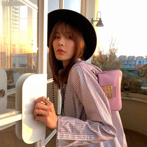 fashion women's new high-quality versatile bag luxury designer women's button armpit shoulder bag temperament trend pure color com
fashion women's new high-quality versatile bag luxury designer women's button armpit shoulder bag temperament trend pure color com