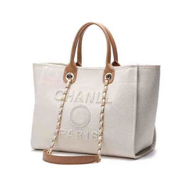 luxury classic designer beach bags canvas pearl evening bag portable shopping large capacity handbag brand women handbags label backpack lad
luxury classic designer beach bags canvas pearl evening bag portable shopping large capacity handbag brand women handbags label backpack lad