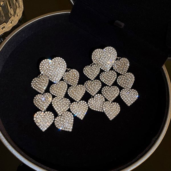 silver stud rhinestone-encrusted heart-shaped tassel earrings fashion european and american style exaggerated heavy industry earrings gracef, Golden
silver stud rhinestone-encrusted heart-shaped tassel earrings fashion european and american style exaggerated heavy industry earrings gracef, Golden