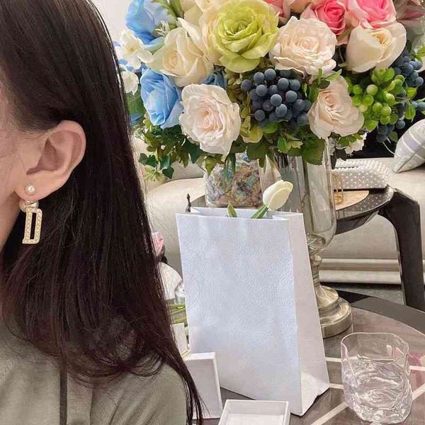 women's fashion personality trend new brand earrings wholesale home di front back pearl simple versatile east gate trendy, Silver
women's fashion personality trend new brand earrings wholesale home di front back pearl simple versatile east gate trendy, Silver
