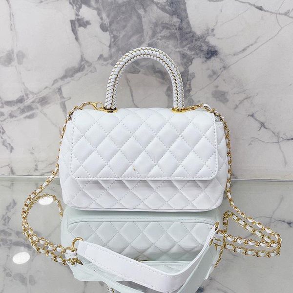 22ss classic mini flap bag with co handle tote bags womens calfskin genuine leather quilted gold metal hardware turn lock crossbody shoulder
22ss classic mini flap bag with co handle tote bags womens calfskin genuine leather quilted gold metal hardware turn lock crossbody shoulder