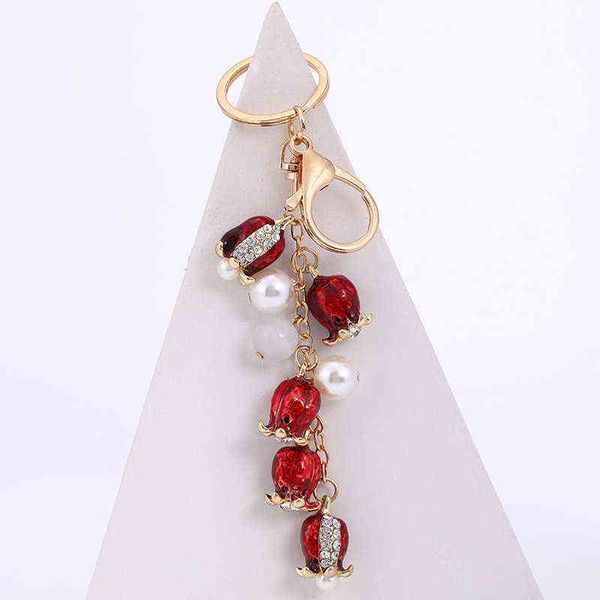 red 2022 creative tulip flower pearl key chain alloy car, Slivery;golden
red 2022 creative tulip flower pearl key chain alloy car, Slivery;golden