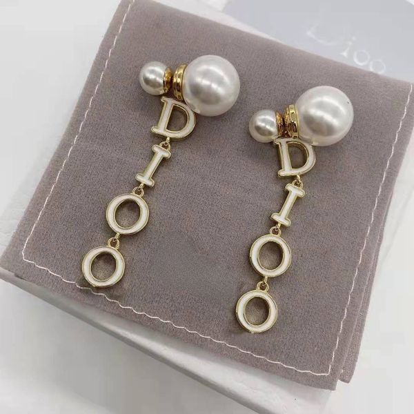 d new white letters long tassel earrings size pearl front and back earrings minority temperament female, Golden;silver
d new white letters long tassel earrings size pearl front and back earrings minority temperament female, Golden;silver