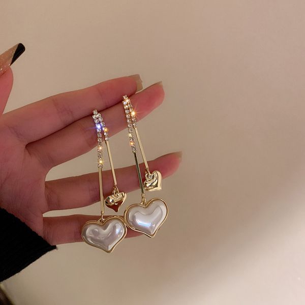 925 silver needle pearl love heart earrings korean diamond-embedded fashion high-key eardrop metal light luxury high-grade earrings for wome, Golden
925 silver needle pearl love heart earrings korean diamond-embedded fashion high-key eardrop metal light luxury high-grade earrings for wome, Golden