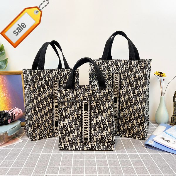 2022 trendy fashion design ladies bags factory direct clothing handbag canvas large capacity office
2022 trendy fashion design ladies bags factory direct clothing handbag canvas large capacity office