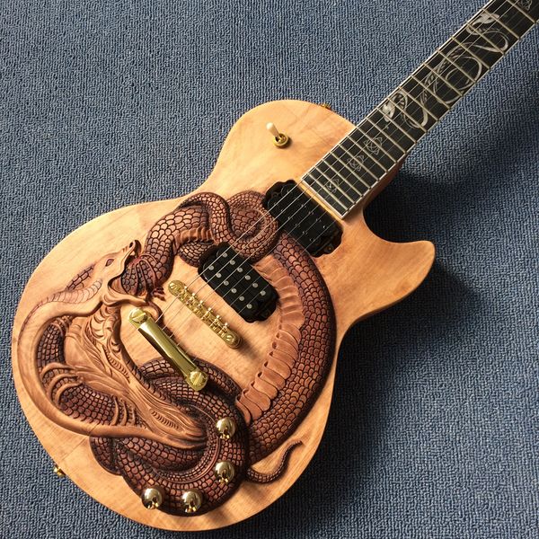 rosewood fingerboard electric guitar, snake inlaid, snake relief solid mahogany body
rosewood fingerboard electric guitar, snake inlaid, snake relief solid mahogany body