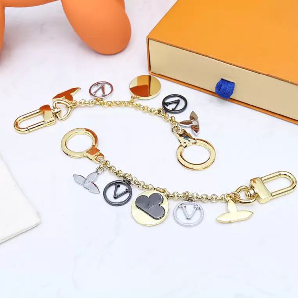 designer letter keychain with black gold buckle fashion pendant keyring trendy mens key chain car key ring womens keychains ornaments 220726, Silver
designer letter keychain with black gold buckle fashion pendant keyring trendy mens key chain car key ring womens keychains ornaments 220726, Silver