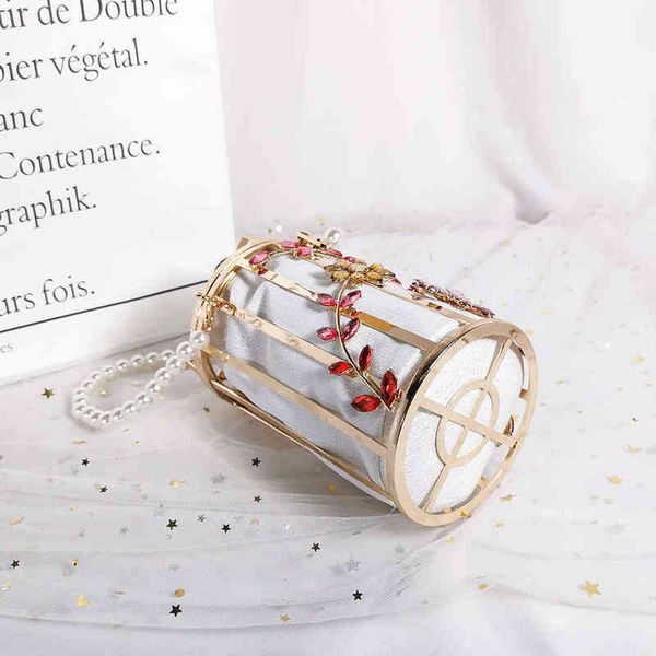 evening bag crystal floral bag women 2022 new cute round pearl hollow out clutch purse and handbag luxury designer metallic bags 220622
evening bag crystal floral bag women 2022 new cute round pearl hollow out clutch purse and handbag luxury designer metallic bags 220622
