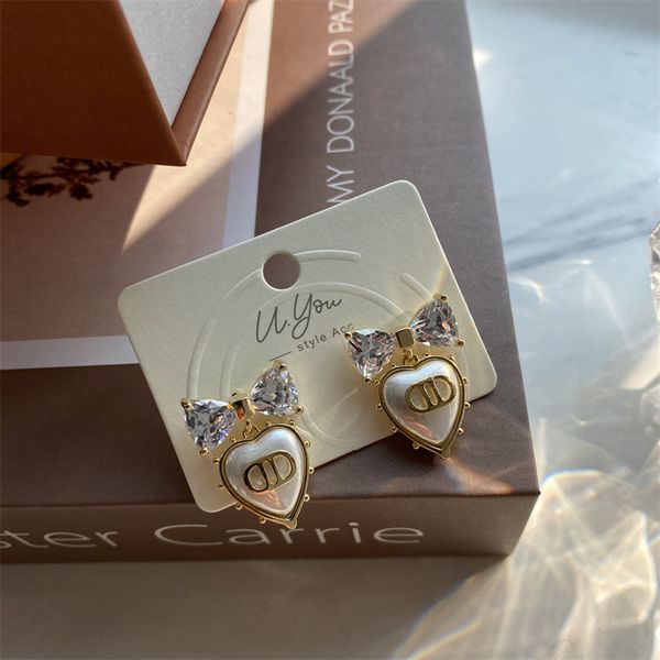 2022 new u you jewelry network red blogger same bow zircon pearl earrings pig nose love sweet, Golden
2022 new u you jewelry network red blogger same bow zircon pearl earrings pig nose love sweet, Golden