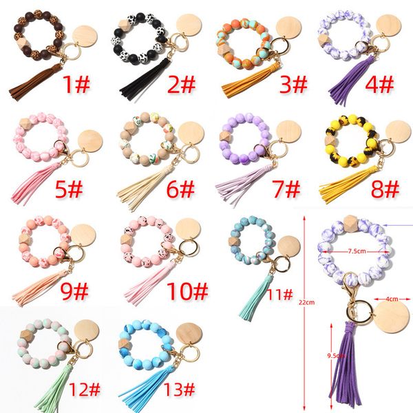 printed silicone beads keychain for keys wood bead bracelet keyring with tassel women men fashion wooden chips keyring wholesale, Silver
printed silicone beads keychain for keys wood bead bracelet keyring with tassel women men fashion wooden chips keyring wholesale, Silver