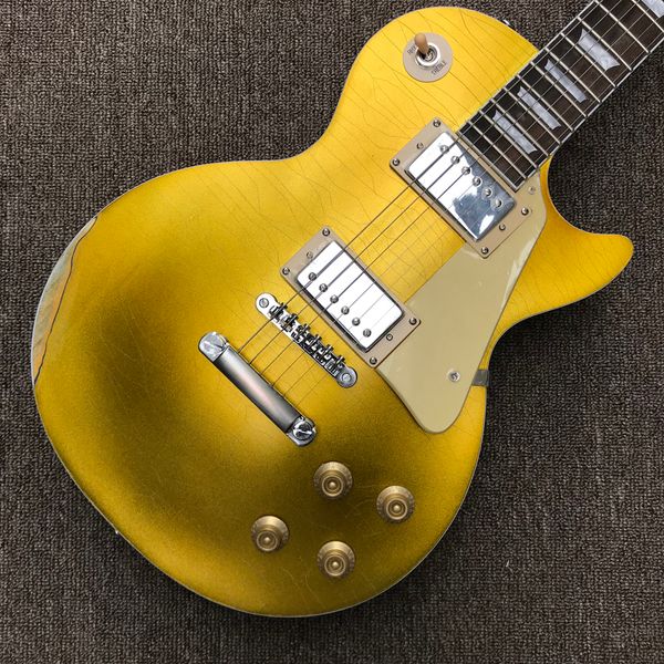 relic electric guitar, rosewood fingerboard, chrome hardware, 2 pickups, gold solid mahogany guitar
relic electric guitar, rosewood fingerboard, chrome hardware, 2 pickups, gold solid mahogany guitar