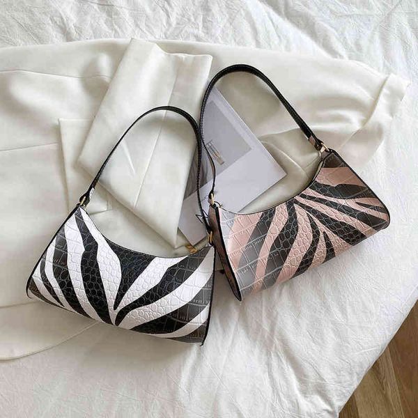2021 new vintage women hobos bag zebra pattern print shoulder ladies pu leather elegant ladies handbag shoulder bag g220519
2021 new vintage women hobos bag zebra pattern print shoulder ladies pu leather elegant ladies handbag shoulder bag g220519