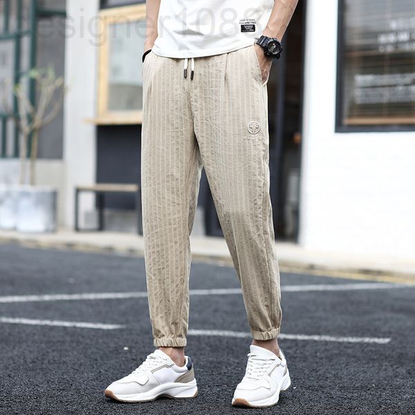 men's pants designer casual pants men's summer thin loose sports trend elastic waist harlan ice ultra-thin nine point men 9290, Black
men's pants designer casual pants men's summer thin loose sports trend elastic waist harlan ice ultra-thin nine point men 9290, Black