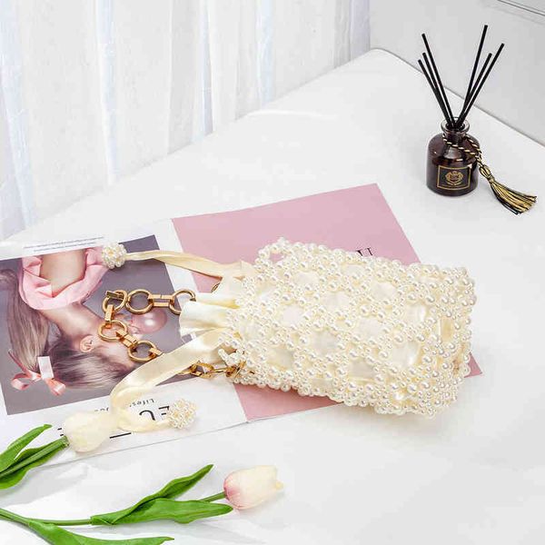 evening bag thick metal necklace pearl handbag women new elegant handmade hollow out bead small barrel shaped wallet female wedding party 22
evening bag thick metal necklace pearl handbag women new elegant handmade hollow out bead small barrel shaped wallet female wedding party 22