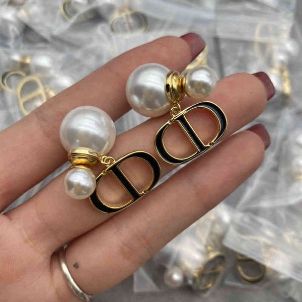 women's fashion personality trend new brand earrings wholesale family di pearl s tremella needle high version, Silver
women's fashion personality trend new brand earrings wholesale family di pearl s tremella needle high version, Silver