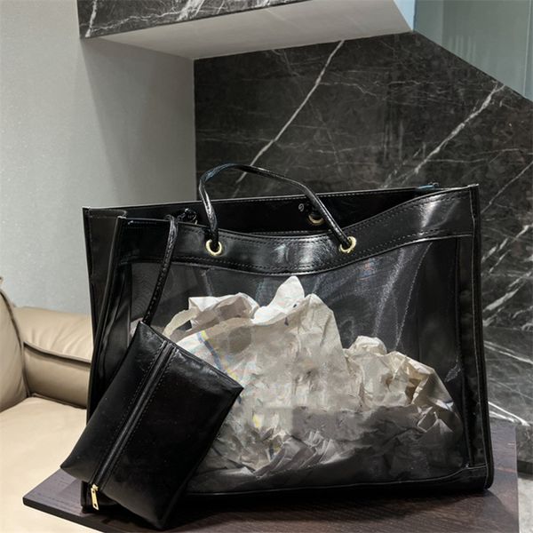 the new summer hollow-out tote bag with zero wallet large capacity casual versatile luxury design handbags designer
the new summer hollow-out tote bag with zero wallet large capacity casual versatile luxury design handbags designer