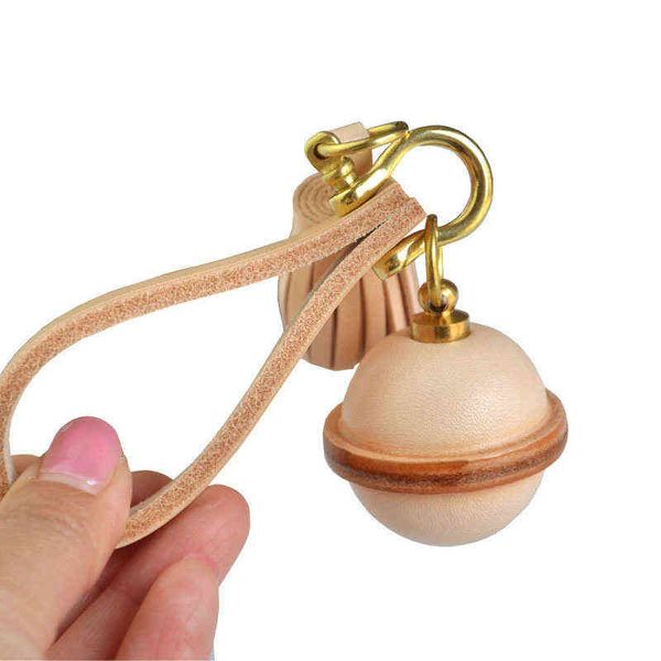 cowhide bell key chain pendant new vegetable tanned key chain edging colorful leather, Silver
cowhide bell key chain pendant new vegetable tanned key chain edging colorful leather, Silver
