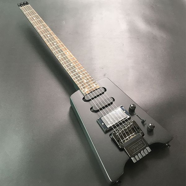 2022 headless 6-string electric guitar black paint portable travel guitar vibrato guitar
2022 headless 6-string electric guitar black paint portable travel guitar vibrato guitar