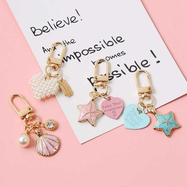 keychains ins five pointed star shell airplads pendant apple bluetooth headset case key chain bag, Silver
keychains ins five pointed star shell airplads pendant apple bluetooth headset case key chain bag, Silver