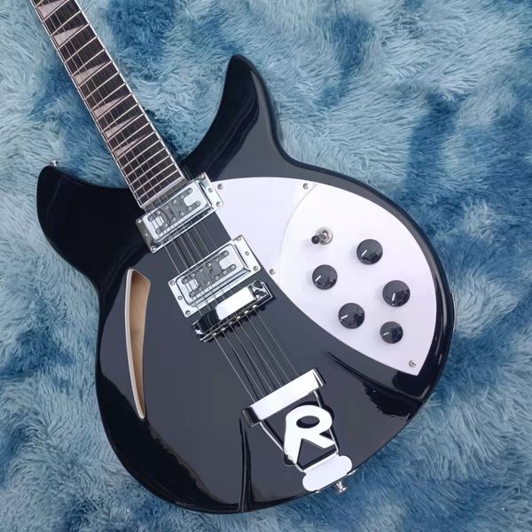 2022 6 string guitar, r 360 electric guitar, black painted body with mahogany fingerboard
2022 6 string guitar, r 360 electric guitar, black painted body with mahogany fingerboard