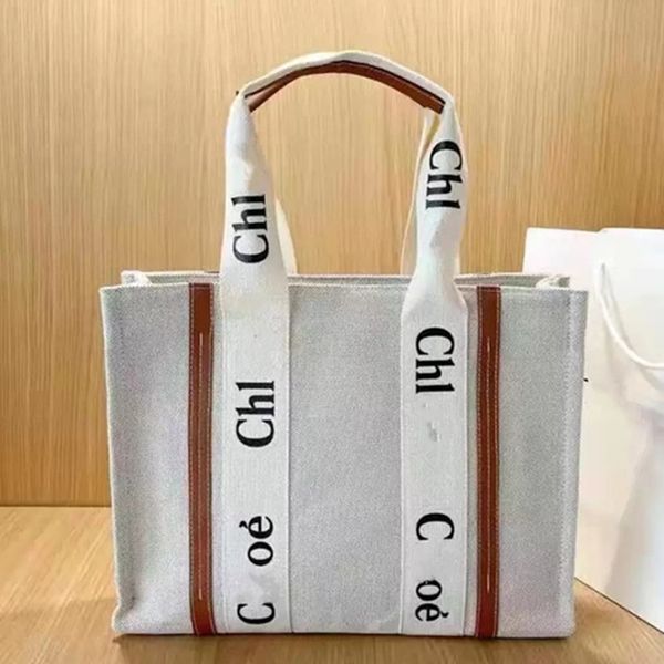2022 designer handbags women woody tote hand bag shopping bags canvas shopper stylish letters beach lunch pouch purse travel sport gym purse
2022 designer handbags women woody tote hand bag shopping bags canvas shopper stylish letters beach lunch pouch purse travel sport gym purse