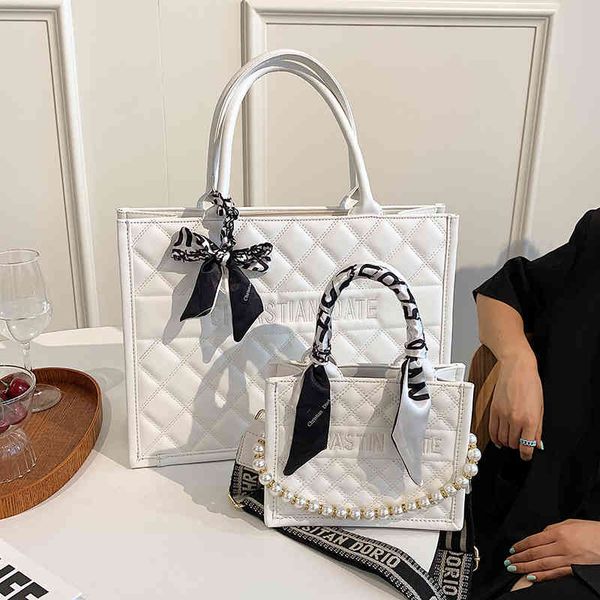 factory wholesale diamond check pearl beaded silk scarf bow square bag personalized fashion women's simple
factory wholesale diamond check pearl beaded silk scarf bow square bag personalized fashion women's simple