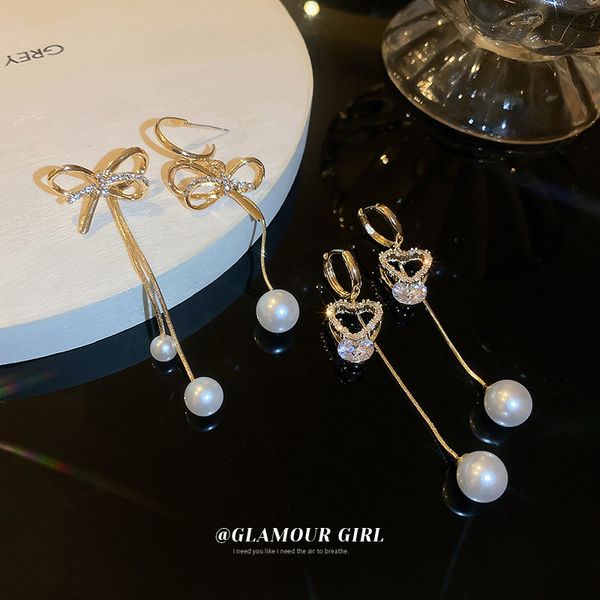 silver needle asymmetric micro inlaid zircon bow earrings korean design long tassel earrings fashion eardrop for women, Golden
silver needle asymmetric micro inlaid zircon bow earrings korean design long tassel earrings fashion eardrop for women, Golden