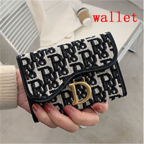 canvas embroiderynew designer embroidery small wallet women's short style contrast color simple folding buckle retro multi-card small c, Red;black
canvas embroiderynew designer embroidery small wallet women's short style contrast color simple folding buckle retro multi-card small c, Red;black