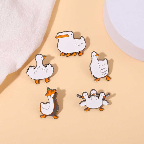 popular new cartoon bite knife little white goose dancing duck shape design alloy metal brooch, Gray
popular new cartoon bite knife little white goose dancing duck shape design alloy metal brooch, Gray