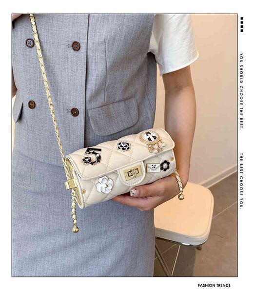 pearl badge camellia sequins human head square lock chain rhombic lattice cylinder bag msenger personality small fragrance designer bags
pearl badge camellia sequins human head square lock chain rhombic lattice cylinder bag msenger personality small fragrance designer bags