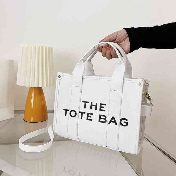 summer the tote bag shoulder messenger letter women's shoulder bag portable square bag versatile women's designer brand handbag 22
summer the tote bag shoulder messenger letter women's shoulder bag portable square bag versatile women's designer brand handbag 22