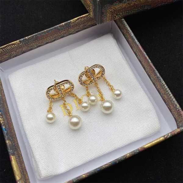 the new 70% off family cd pearl classic fashion baby star same letter tassel female earrings, Golden
the new 70% off family cd pearl classic fashion baby star same letter tassel female earrings, Golden