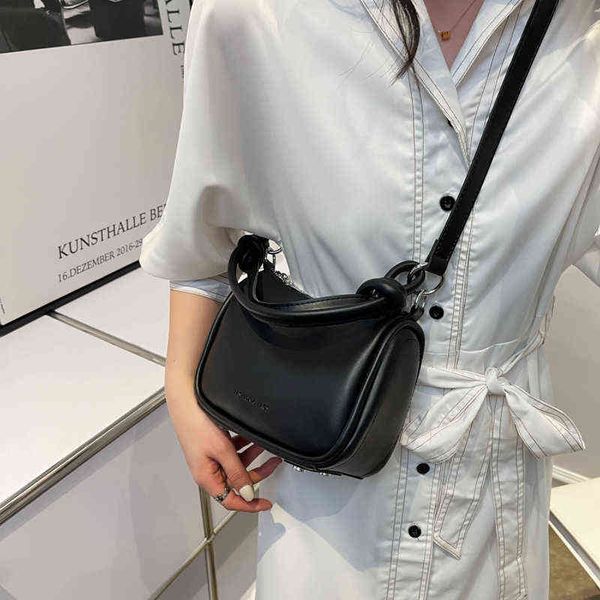 spring and summer handbag 2022 new solid color messenger simple niche french shoulder bag designer handbags y220421
spring and summer handbag 2022 new solid color messenger simple niche french shoulder bag designer handbags y220421