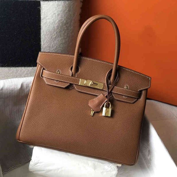 cattle bag 2022 litchi layer leather herme new temperament yy v042 
cattle bag 2022 litchi layer leather herme new temperament yy v042