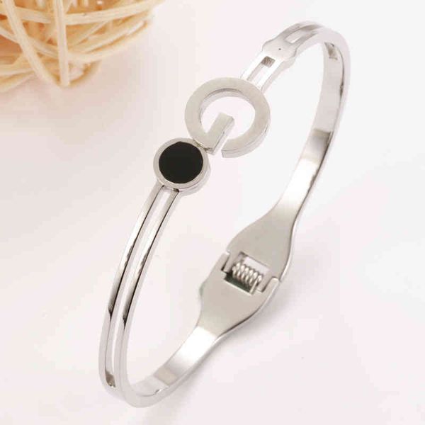 fashion g-shaped hollow out shell steel hand jewelry popular color stainless spring, White
fashion g-shaped hollow out shell steel hand jewelry popular color stainless spring, White