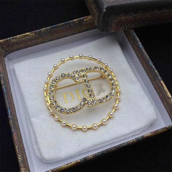 the new 70% off dijia new fashion hollow out cd letter full diamond pearl brooch women's net red same bra, Gray
the new 70% off dijia new fashion hollow out cd letter full diamond pearl brooch women's net red same bra, Gray