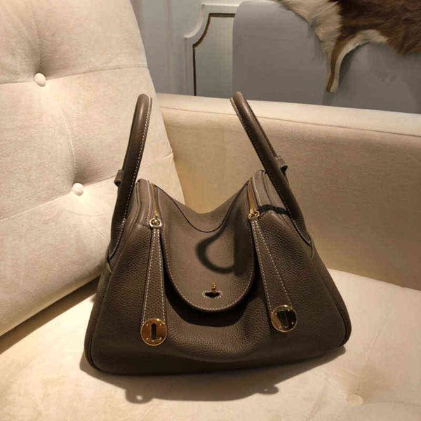 designer lindihandbag straight leather lindi single shoulder portable messenger doctor bag
designer lindihandbag straight leather lindi single shoulder portable messenger doctor bag