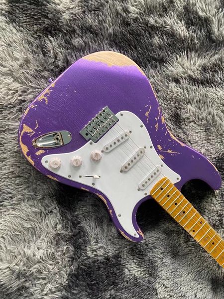 purple aged st electric guitar body ash with white pick guard fingerboard rabbet design
purple aged st electric guitar body ash with white pick guard fingerboard rabbet design