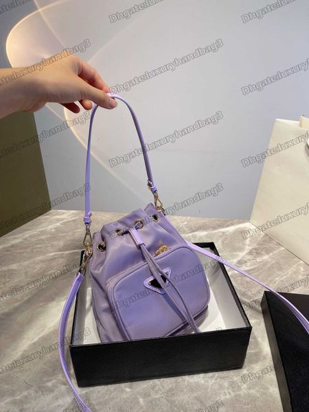 women's black duet nylon bucket bag metal triangle luxury crossbody fabric desert beige/aqua/pink for ladies -print
women's black duet nylon bucket bag metal triangle luxury crossbody fabric desert beige/aqua/pink for ladies -print